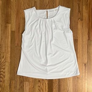 Calvin Klein women’s white sleeveless blouse.